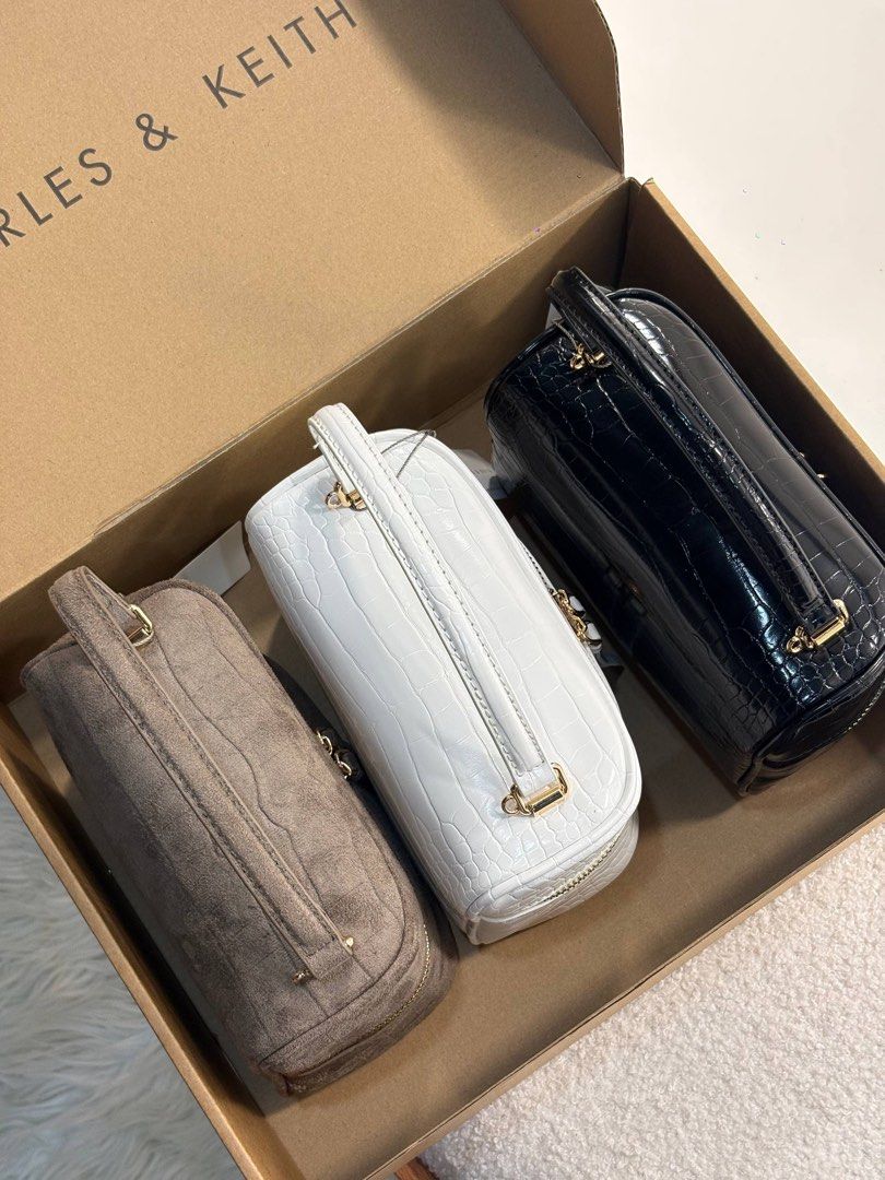 CNK Croc effect vanity bag (Category: Cross-body Bags) located in Manila. Submitted by whimsy.finds (Listing ID 1469598046, Image 2). Description: Add fee for box and paperbag Payment first basis via Gcash / Maribank / Maya Ship via Lalamove / JNT *No rush shipping as admin will handle booking for lala *Open for bulk order .
