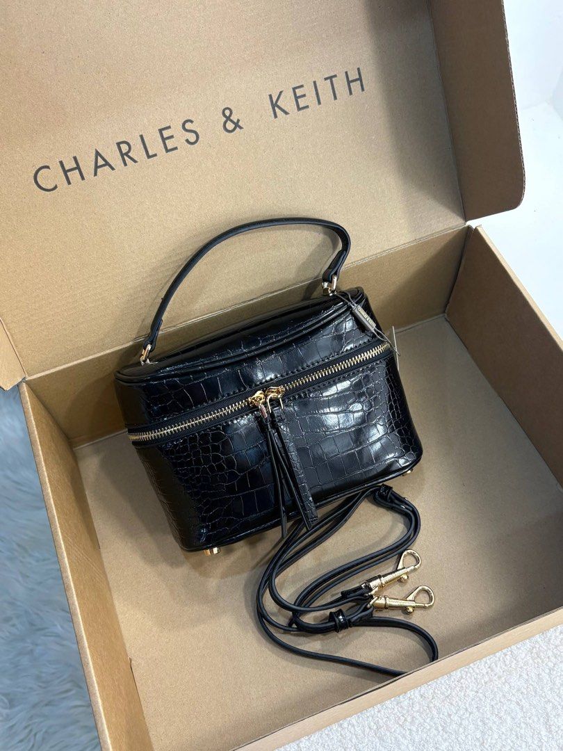 CNK Croc effect vanity bag (Category: Cross-body Bags) located in Manila. Submitted by whimsy.finds (Listing ID 1469598046, Image 3). Description: Add fee for box and paperbag Payment first basis via Gcash / Maribank / Maya Ship via Lalamove / JNT *No rush shipping as admin will handle booking for lala *Open for bulk order .
