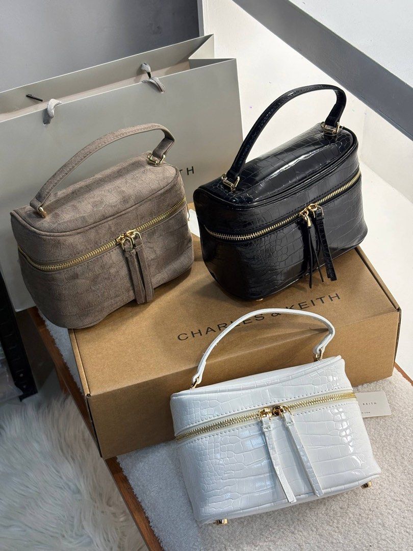 CNK Croc effect vanity bag (Category: Cross-body Bags) located in Manila. Submitted by whimsy.finds (Listing ID 1469598046, Image 1). Description: Add fee for box and paperbag Payment first basis via Gcash / Maribank / Maya Ship via Lalamove / JNT *No rush shipping as admin will handle booking for lala *Open for bulk order .