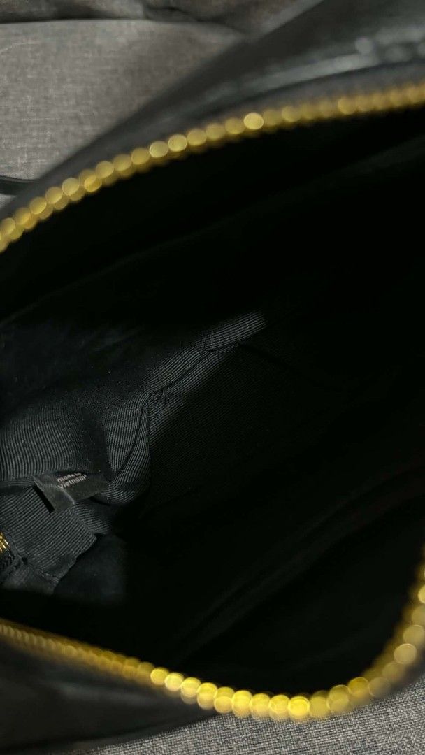Coach Black Leather Camera Crossbody Bag (Category: Cross-body Bags) located in Cavite. Submitted by loriojenni09117 (Listing ID 1469714249, Image 3). Description: - Brand: Coach - Material: Premium black pebble leather - Hardware: Elegant gold-tone - Closure: Secure zip top - Strap: Adjustable shoulder strap included - Interior: Clean lining with a convenient slip pocket - Details: Serial tag reads L1947-7734 | Made in Vietnam - Style: Classic e
