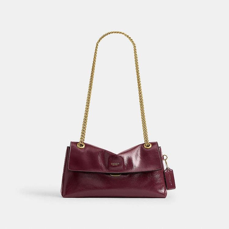 Coach Chelsea Shoulder Bag 26 (Category: Shoulder Bags) located in Las Pinas. Submitted by shopwithmira13 (Listing ID 1469573892, Image 3). Description: Measurements Length: 10.75" Height: 5.5" Width: 2.5" Materials Glazed leather Suede lining Strap Chain strap with 21.5" drop for shoulder or crossbody wear Features Inside zip pocket Pushlock closure.