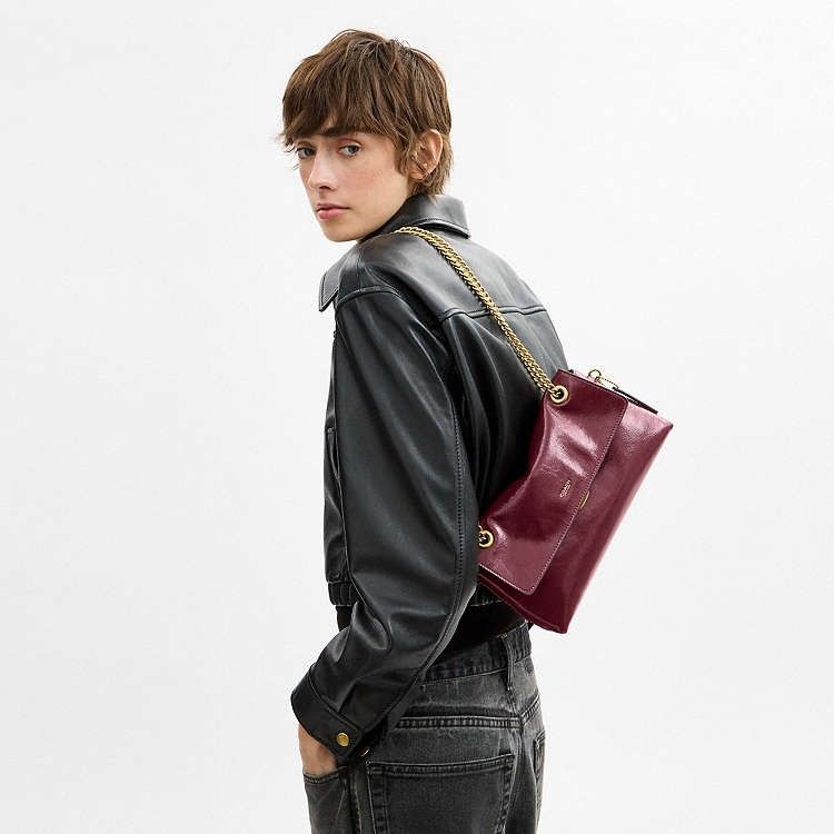 Coach Chelsea Shoulder Bag 26 (Category: Shoulder Bags) located in Las Pinas. Submitted by shopwithmira13 (Listing ID 1469573892, Image 1). Description: Measurements Length: 10.75" Height: 5.5" Width: 2.5" Materials Glazed leather Suede lining Strap Chain strap with 21.5" drop for shoulder or crossbody wear Features Inside zip pocket Pushlock closure.