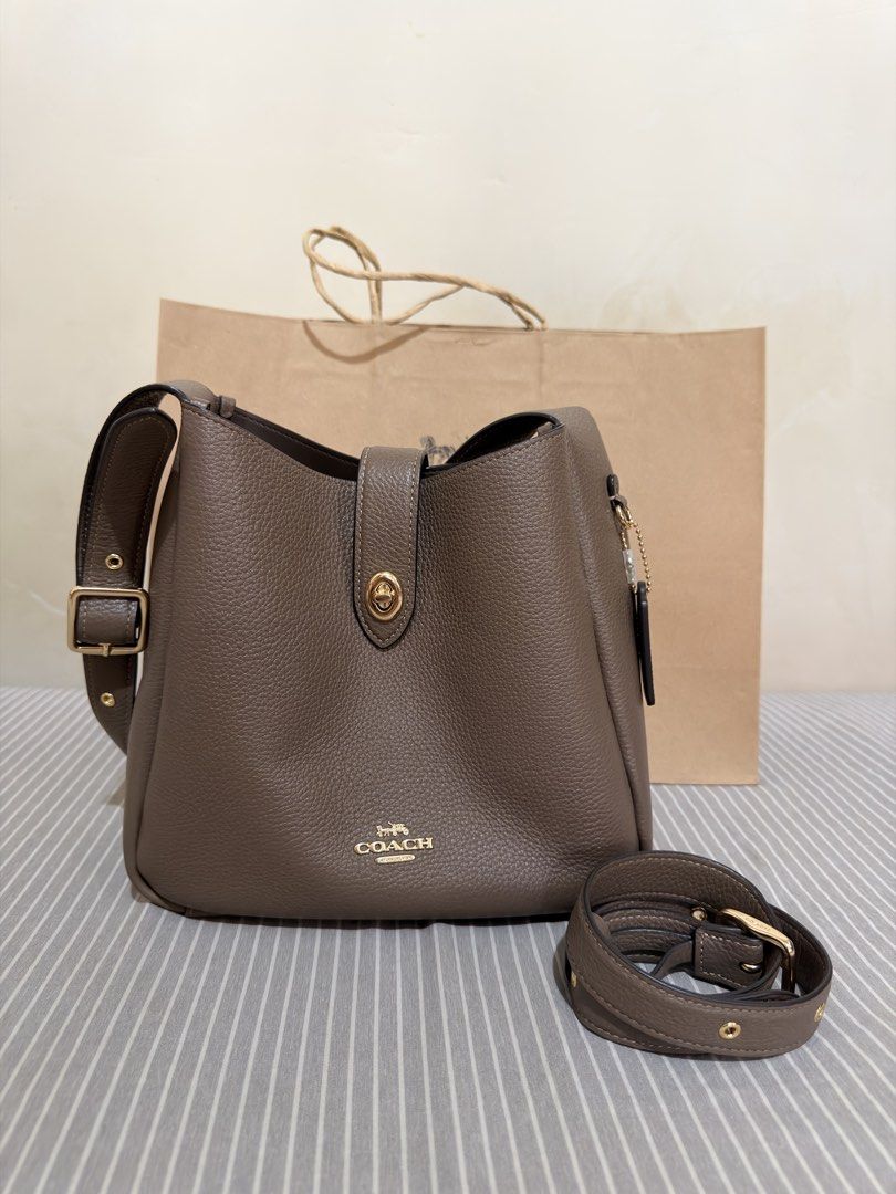 Coach Hadley Convertible Crossbody Bag (Category: Shoulder Bags) located in San Mateo. Submitted by ktrnugh (Listing ID 1469627897, Image 2). Description: For sale: Coach Hadley Convertible Crossbody Bag (regular size) Color: Dark Stone 🏷️ Price is negotiable Condition: Very good - lightly used - Bought from Coach outlet / authentic - Comes with crossbody strap, paper bag, and original Coach dustbag (bought separately) RFS: Decluttering 📍Batasa
