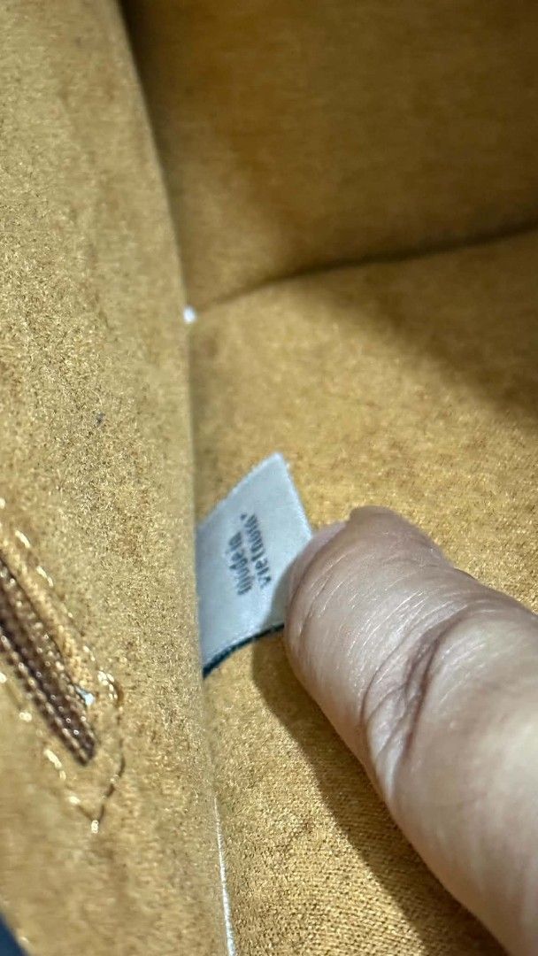 Coach Hutton Canvas Shoulder Bag (Category: Shoulder Bags) located in Cavite. Submitted by loriojenni09117 (Listing ID 1469712868, Image 3). Description: - Coach shoulder/crossbody bag - Beige canvas body with durable brown leather trim - Elegant gold-tone hardware with engraved Coach logo pushlock closure - Spacious interior with multiple compartments and a secure zip pocket - Soft brown suede-like lining - Adjustable strap for shoulder or cross