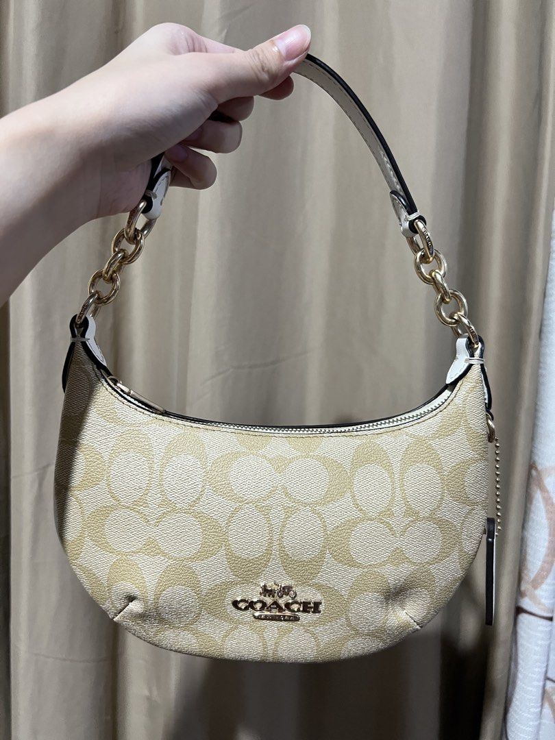 Coach Mini Payton in Signature Canvas (Category: Luxury Bags & Wallets) located in Naga. Submitted by iboninay (Listing ID 1469703816, Image 3). Description: - Authentic Coach signature C canvas shoulder bag - Color: Light khaki/chalk with elegant gold-tone hardware - Rfs: too small for me .