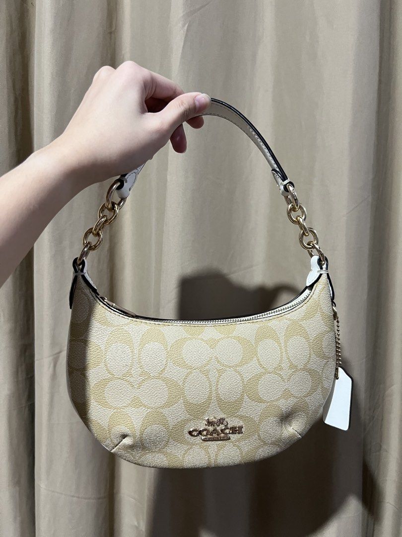 Coach Mini Payton in Signature Canvas (Category: Luxury Bags & Wallets) located in Naga. Submitted by iboninay (Listing ID 1469703816, Image 1). Description: - Authentic Coach signature C canvas shoulder bag - Color: Light khaki/chalk with elegant gold-tone hardware - Rfs: too small for me .