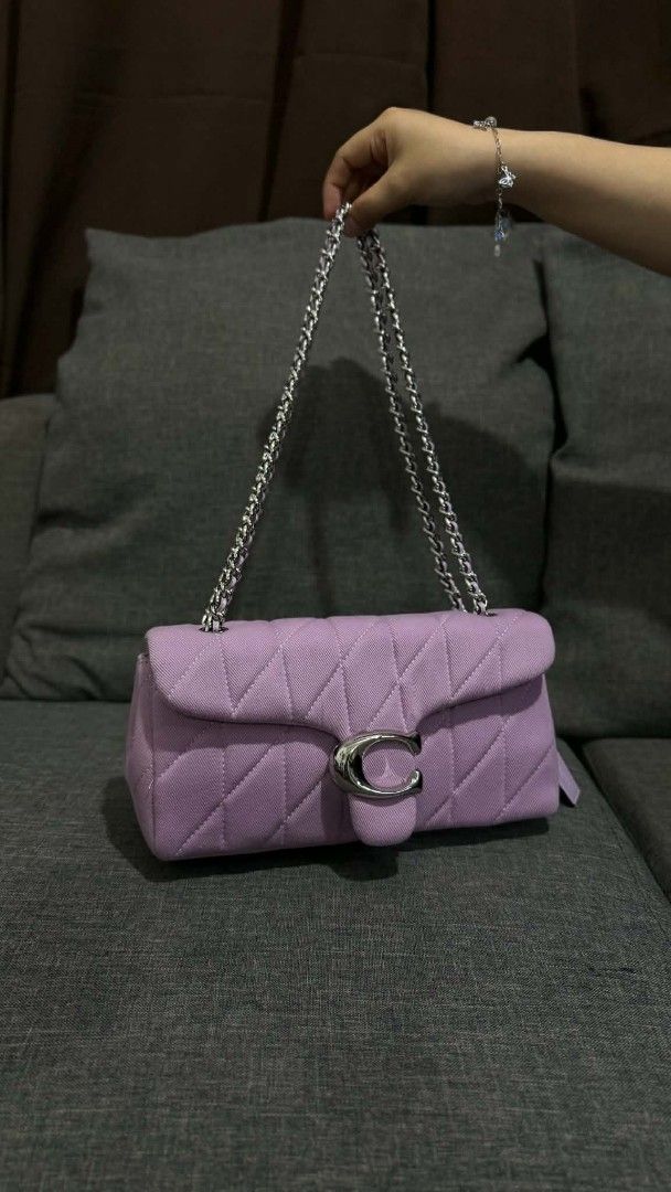 Coach Quilted Pillow Madison Shoulder Bag Lilac (Category: Luxury Bags & Wallets) located in Cavite. Submitted by loriojenni09117 (Listing ID 1469701944, Image 1). Description: - Brand: Coach - Color: Lilac - Material: Quilted fabric - Hardware: Silver-tone chain strap and signature C pushlock closure - Interior: Matching fabric lining with convenient zip pocket - Origin: Made in Cambodia - Serial Number: C2591-CBG31 - Condition: Excellent, clean