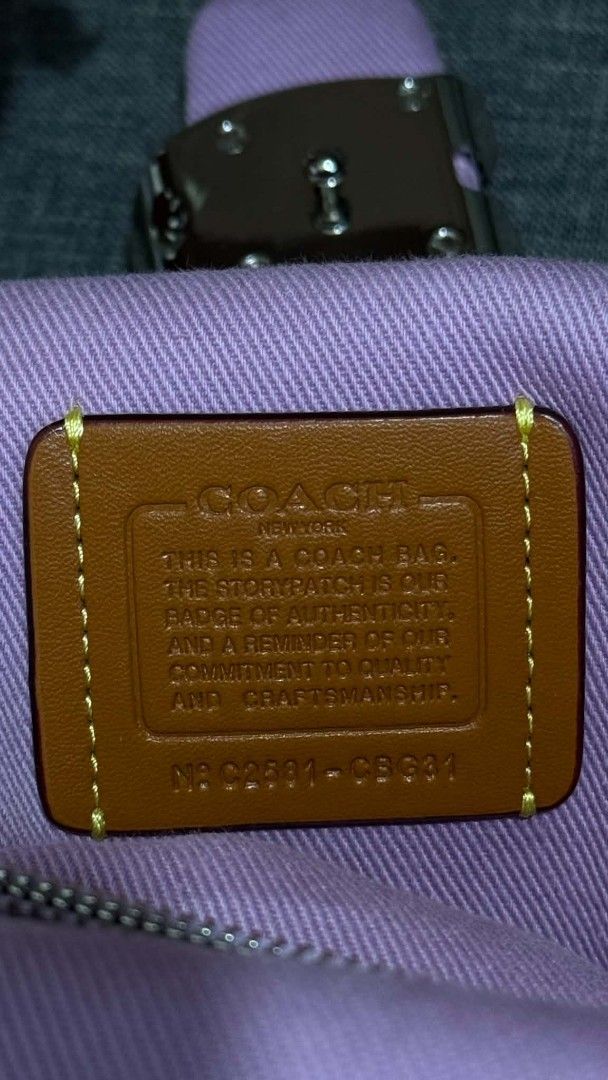 Coach Quilted Pillow Madison Shoulder Bag Lilac (Category: Luxury Bags & Wallets) located in Cavite. Submitted by loriojenni09117 (Listing ID 1469701944, Image 3). Description: - Brand: Coach - Color: Lilac - Material: Quilted fabric - Hardware: Silver-tone chain strap and signature C pushlock closure - Interior: Matching fabric lining with convenient zip pocket - Origin: Made in Cambodia - Serial Number: C2591-CBG31 - Condition: Excellent, clean