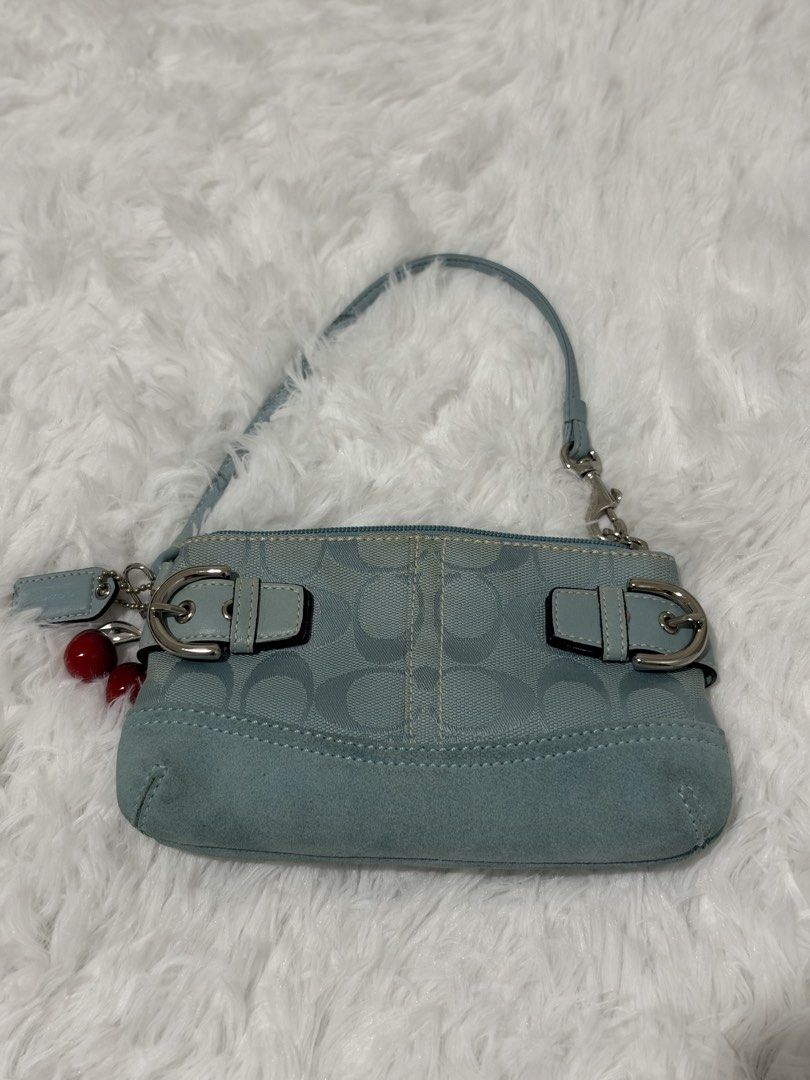 Coach Signature C Suede Light Blue Mini Handbag (Category: Luxury Bags & Wallets) located in Manila. Submitted by ms.cee_ (Listing ID 1469706628, Image 1). Description: INCH ⁉️ DM. 📨.