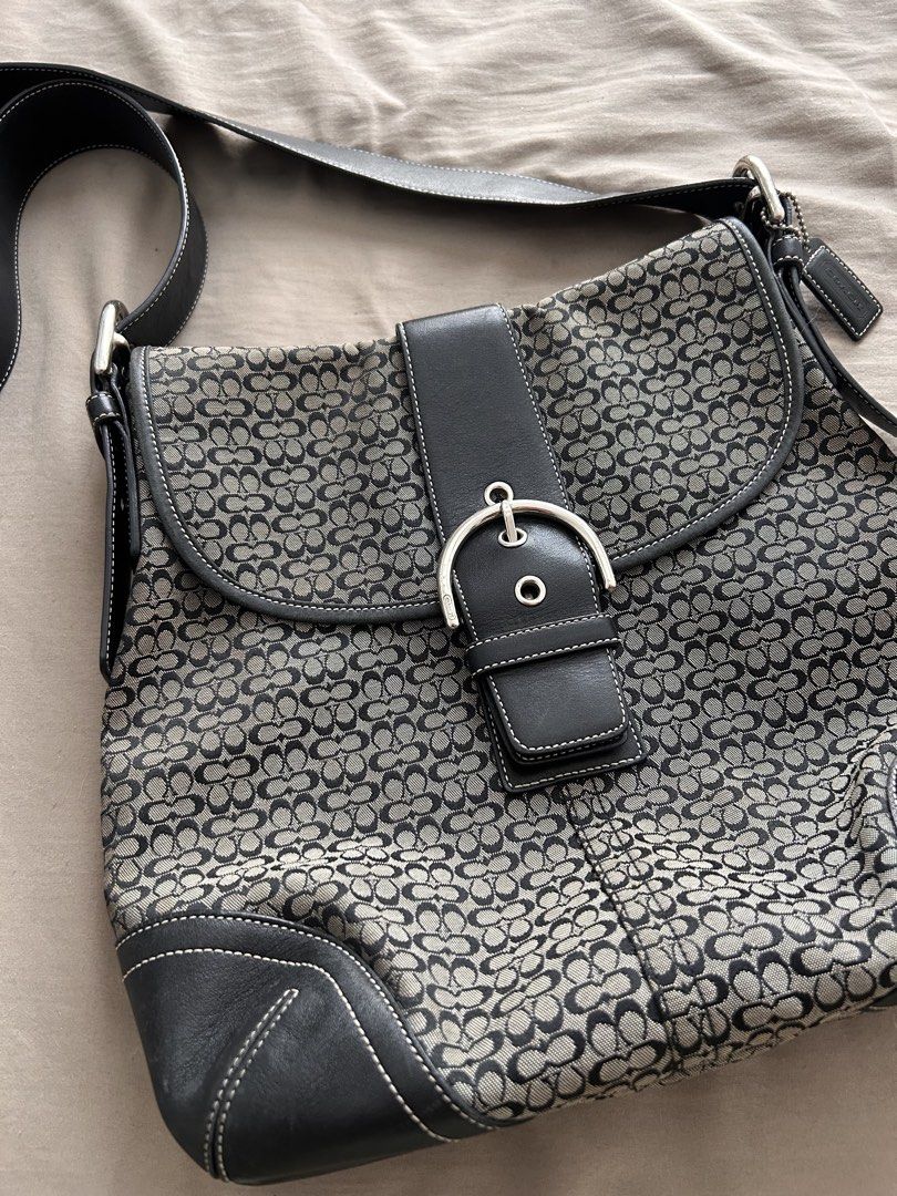 Coach Soho Flap Crossbody Bag (Category: Luxury Bags & Wallets) located in Pasig City. Submitted by cha.declutterz (Listing ID 1469670157, Image 2). Description: Authentic vintage Coach messenger bag Serial: F3K-6377 No major flaws, 9/10 quality Spacious, kasya ipad Vintage, pls manage your expectations Shipping via J&T or Lalamove (sf c/o buyer).