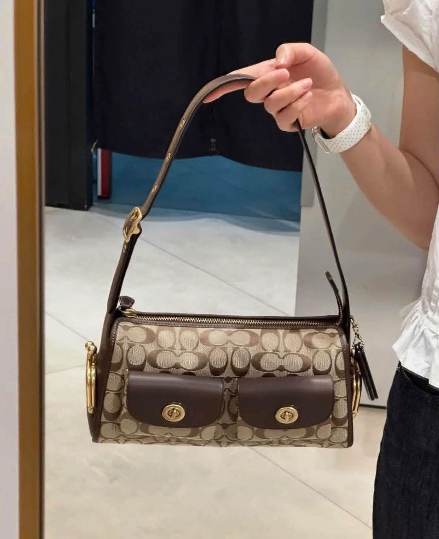 Coach Turnlock Haversack in Signature (Category: Shoulder Bags) located in Quezon City. Submitted by bagsboutiqueph (Listing ID 1469708553, Image 3). Description: LAST PRICE POSTED. LIMITED STOCKS! BRANDNEW WITH INCLUSIONS. COLOR MAY SLIGHTLY VARY IN ACTUAL DUE TO LIGHTING AND CAMERA SETTING. OTHER PHOTOS WILL BE SEND DURING PURCHASE AND FOR SURE BUYERS ONLY. WHEN IN DOUBT, DO NOT ORDER. THANK YOU..