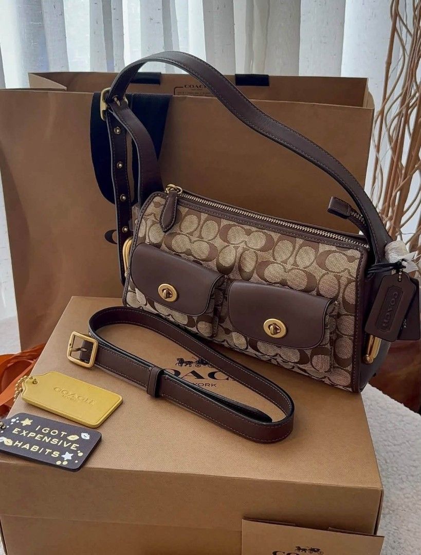 Coach Turnlock Haversack in Signature (Category: Shoulder Bags) located in Quezon City. Submitted by bagsboutiqueph (Listing ID 1469708553, Image 2). Description: LAST PRICE POSTED. LIMITED STOCKS! BRANDNEW WITH INCLUSIONS. COLOR MAY SLIGHTLY VARY IN ACTUAL DUE TO LIGHTING AND CAMERA SETTING. OTHER PHOTOS WILL BE SEND DURING PURCHASE AND FOR SURE BUYERS ONLY. WHEN IN DOUBT, DO NOT ORDER. THANK YOU..