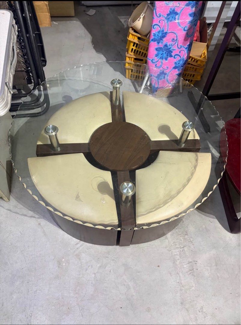Coffee table (Category: Tables & Sets) located in Klang. Submitted by silver_silentphoenix (Listing ID 1469575338, Image 1). Description: ✅ Round glass tabletop ✅ Unique wooden design ✅ Stainless-steel supports ✅ Suitable for living room or office.