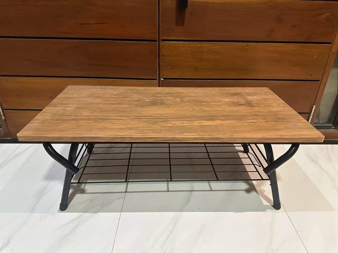 COFFEE TABLE (Category: Announcements) located in Manila. Submitted by nanzkie_2015 (Listing ID 1469651523, Image 2). Description: Folding Low Table with Lower Wire Shelf *Space-saver, portable, and collapsible for easy storage *good as new.