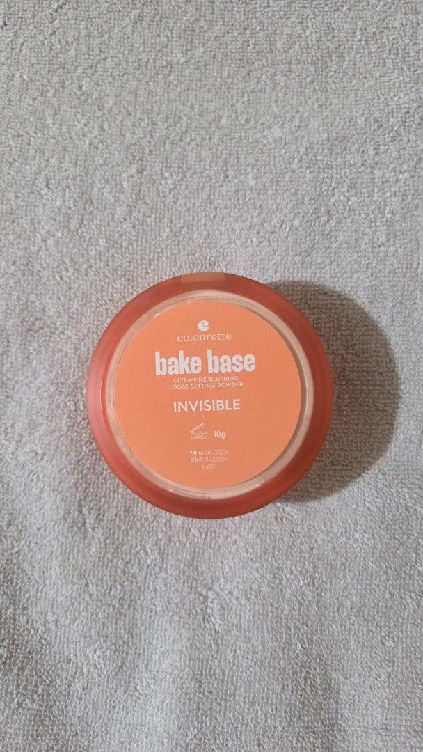 Colourette Bake Base Ultra-Fine Blurring Loose Setting Powder (Category: Makeup) located in Taguig. Submitted by tipidd (Listing ID 1469680079, Image 2). Description: - Brand: Colourette Bake Base Ultra-Fine Blurring Loose Setting Powder - Shade: Invisible (Universal) - Size: Full size, 10g net weight - Condition: new, opened , inner mesh sifter - Packaging: Compact jar with built-in mirror and powder puff applicator included - Dates: Mfg 04/2026