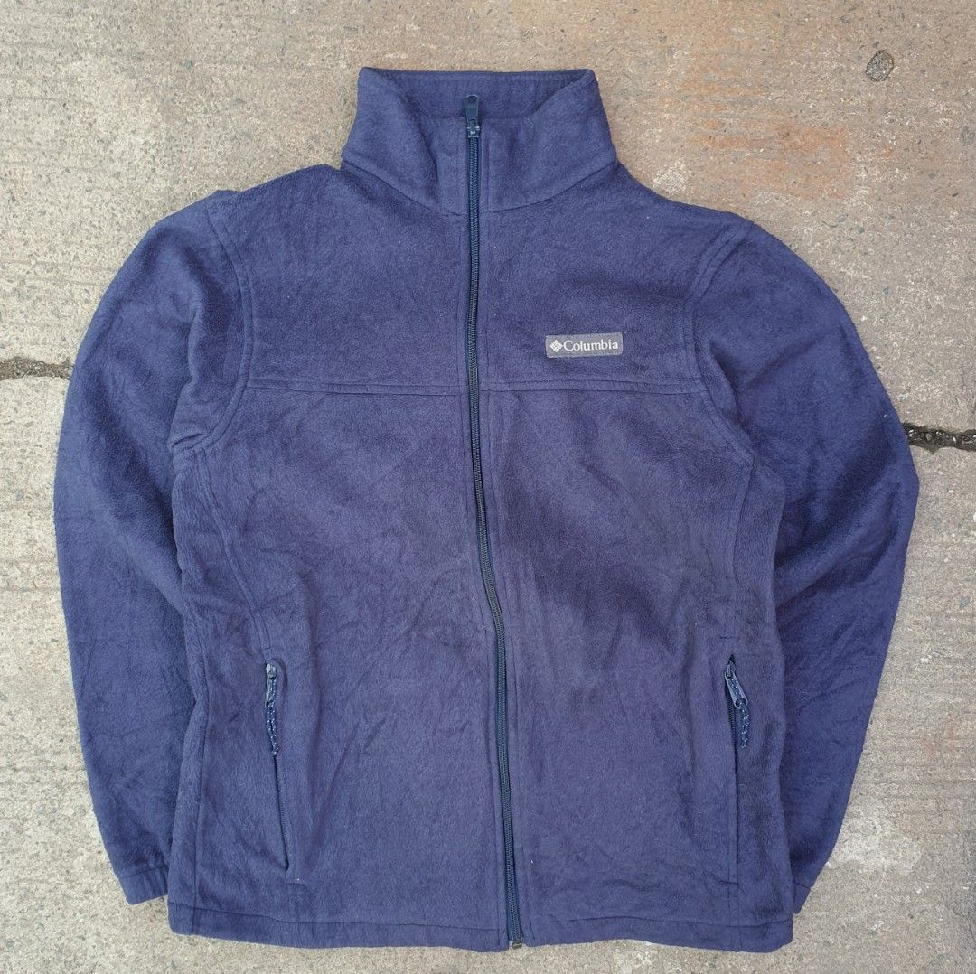 Columbia Full Zip Fleece Jacket Navy Blue (Category: Coats, Jackets and Outerwear) located in Cavite. Submitted by josephnl (Listing ID 1469702854, Image 1). Description: - Brand: Columbia - Item: Full Zip Fleece Jacket - Color: Dark Navy Blue - Size: Tagged S-M (Fits true to size) - Measurements: Width 21" | Length 26" - Details: Stand-up collar, 2 front zipped pockets, embroidered chest logo - Material: Soft polyester fleece - Condition: Excell