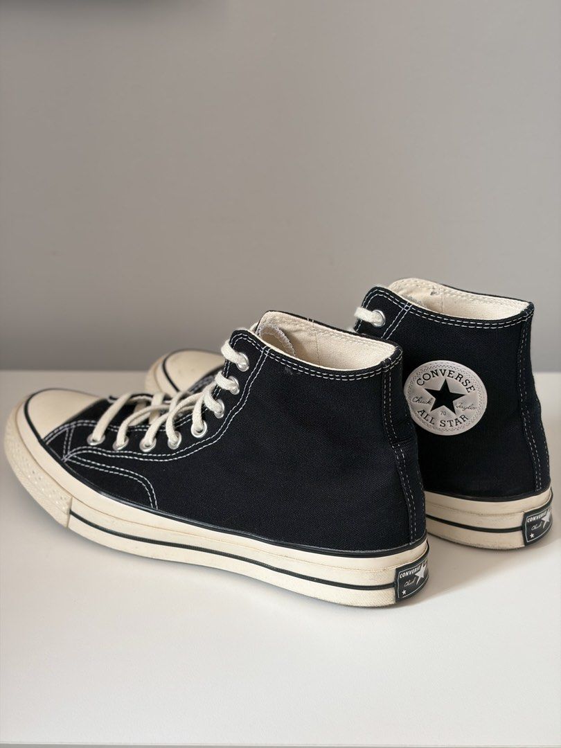 Converse Chuck 70 High Black (Category: Casual Shoes) located in Mandaluyong City. Submitted by luckyphoenix_88ff96 (Listing ID 1469647875, Image 3). Description: - Model: Converse Chuck 70 High Top - Color: Classic Black with Egret Midsoles - Size: Men's 8.5 / Women's 10.5 - Condition: Worn a few times, minimal scuffing on toe caps - Features: Durable canvas upper, contrast white stitching, and cushioned insoles - Inclusion: Original box include