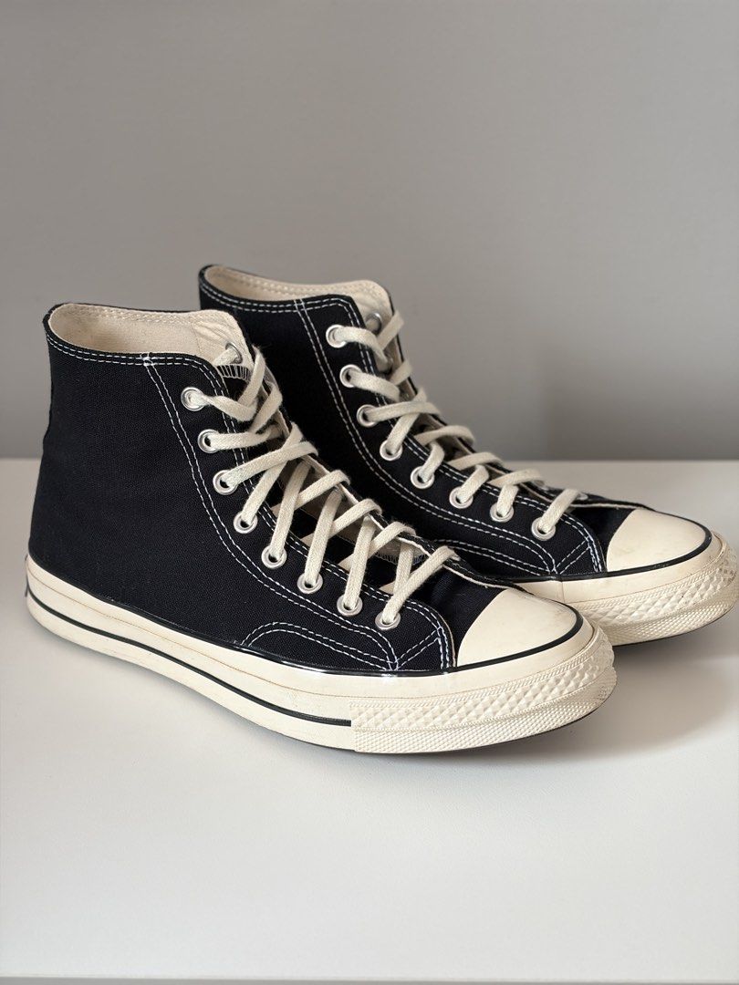Converse Chuck 70 High Black (Category: Casual Shoes) located in Mandaluyong City. Submitted by luckyphoenix_88ff96 (Listing ID 1469647875, Image 2). Description: - Model: Converse Chuck 70 High Top - Color: Classic Black with Egret Midsoles - Size: Men's 8.5 / Women's 10.5 - Condition: Worn a few times, minimal scuffing on toe caps - Features: Durable canvas upper, contrast white stitching, and cushioned insoles - Inclusion: Original box include