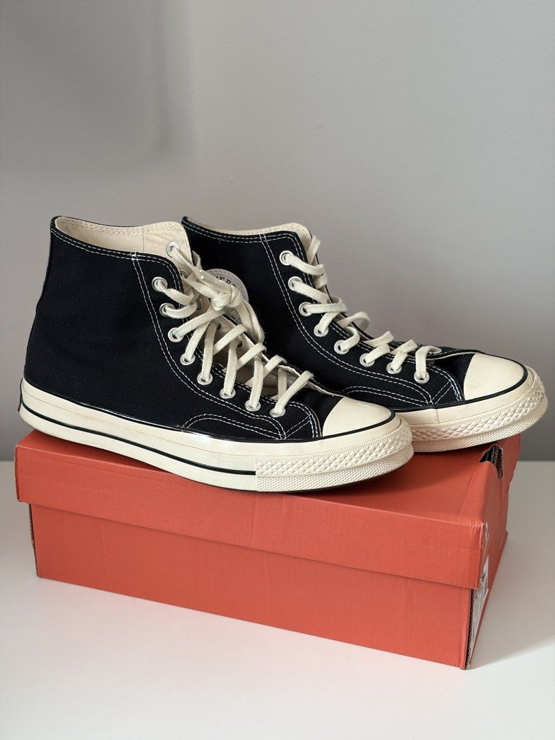 Converse Chuck 70 High Black (Category: Casual Shoes) located in Mandaluyong City. Submitted by luckyphoenix_88ff96 (Listing ID 1469647875, Image 1). Description: - Model: Converse Chuck 70 High Top - Color: Classic Black with Egret Midsoles - Size: Men's 8.5 / Women's 10.5 - Condition: Worn a few times, minimal scuffing on toe caps - Features: Durable canvas upper, contrast white stitching, and cushioned insoles - Inclusion: Original box include