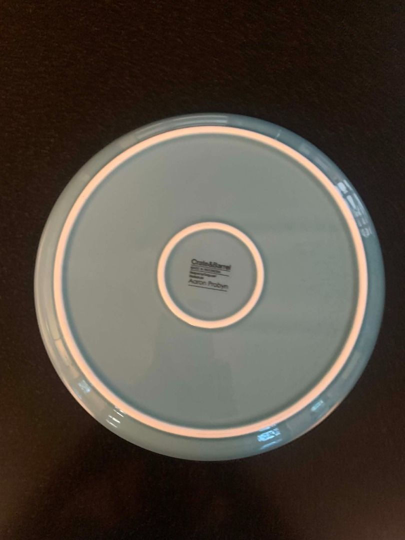 Crate & Barrel Aaron Probyn Blue Dinnerware Set (Category: Dinnerware & Cutlery) located in Pasig City. Submitted by cormatzu (Listing ID 1469632898, Image 3). Description: - Authentic Crate and Barrel dinnerware set designed by Aaron Probyn - Soft blue glaze finish with elegant ridged edge details - Set includes matching dinner plates, salad plates, and bowls - Made in Indonesia with clear maker stamps on the clean bottoms - Condition: Excellent