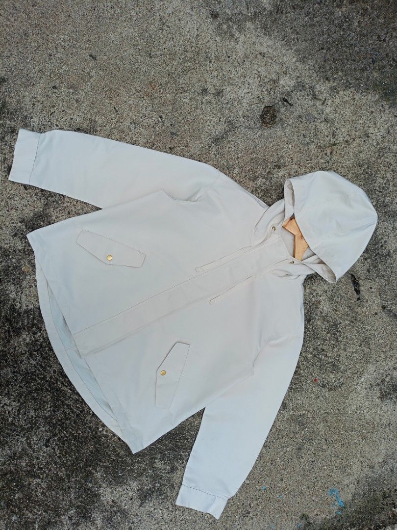 Cream hooded windbreaker jacket with gold hardware (Category: Coats, Jackets and Outerwear) located in General Santos City (Dadiangas). Submitted by jay-fits (Listing ID 1469638075, Image 2). Description: GU Mountain Parka GU Mountain Parka Large on tag 22.5x25 Off White/Cream Color Rate 10/10, 🔥 Excellent Condition Need Wash Location Davao City Mine 880+Sf .