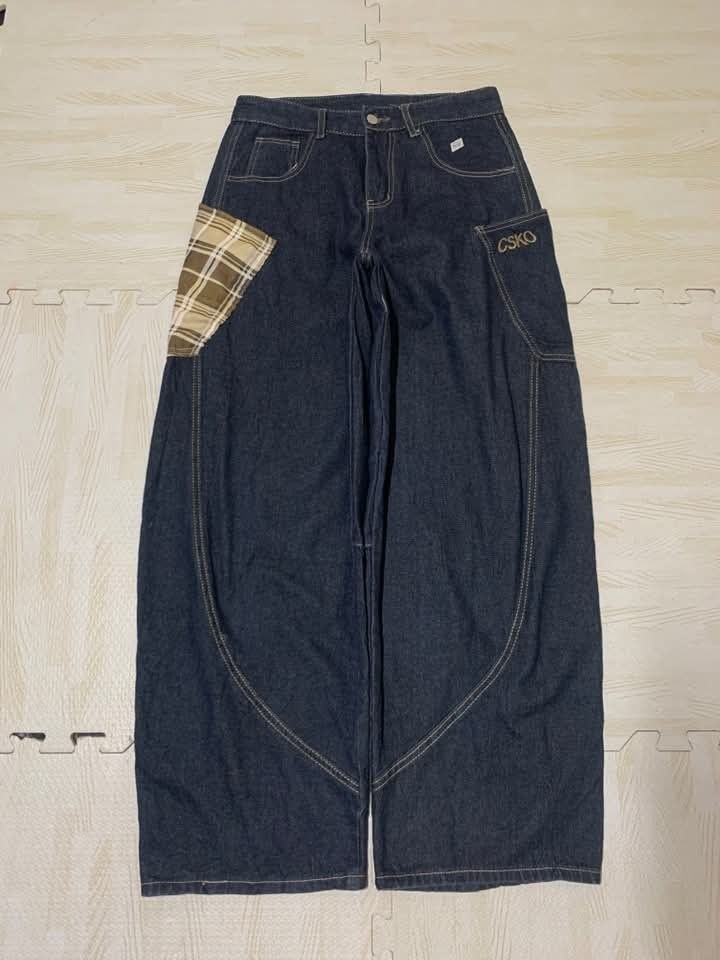 CSKO Dark Denim Wide Leg Barrel Pants Plaid Patch (Category: Jeans) located in Quezon City. Submitted by elle_f08 (Listing ID 1469662222, Image 1). Description: - Dark wash denim with a trendy super wide barrel fit - Contrast plaid patch pocket on the right and utility pocket with CSKO branding on the left - Distinctive heavy curved seams and contrast stitching throughout - Flattering high waist design - Perfect statement piece for your streetwea