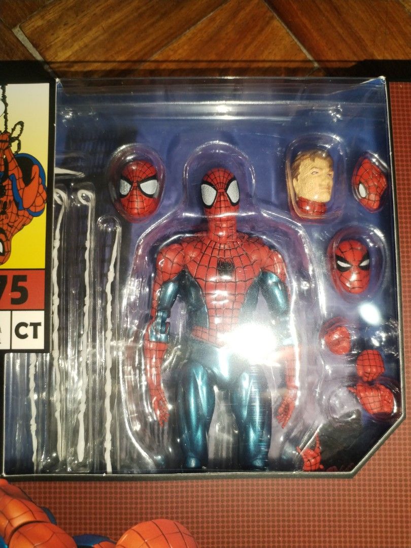 CT Toys 075 Spiderman (Category: Figurines & Statues) located in Marilao. Submitted by xtiandecluttering (Listing ID 1469610496, Image 3). Description: MISB Condition - Figure: Spider-Man 6-inch action figure, #075 - Accessories: Multiple interchangeable head sculpts, alternate hands, and web accessory strings - Packaging: Mint box with comic-style artwork on front and back - Condition: Brand new and collector-friendly.