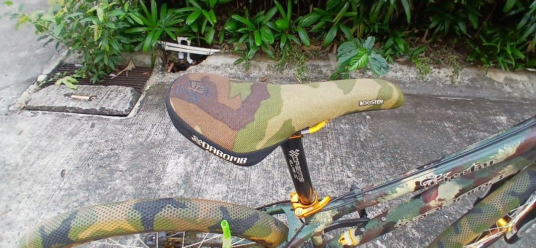 Da bomb MTB 26er (Category: Bicycles) located in Marikina City. Submitted by darthvader888 (Listing ID 1469636349, Image 3). Description: Frame: Authentic Da Bomb Ejector (Classic, bomb-proof 14" aluminum DJ frame) • Tires: Highly sought-after Cult x Vans Waffle Camo Tires 26x2.10 (Excellent tread life) • Wheelset: Da Bomb Camo Rims laced to loud, crisp Gold Anodized Hubs • Gears: Reliable, crisp 1x9 Speed Shimano Alivio Drivetrain setup • Cockpi