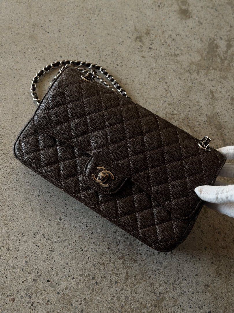 Dark Brown Double Flap in Silver Hardware (Category: Luxury Bags & Wallets) located in Las Pinas. Submitted by vinccid (Listing ID 1469701828, Image 1). Description: ▪️Medium size ▪️Dark Brown choco color ▪️comes with dustbag ▪️silver hardware ▪️no major flaws.