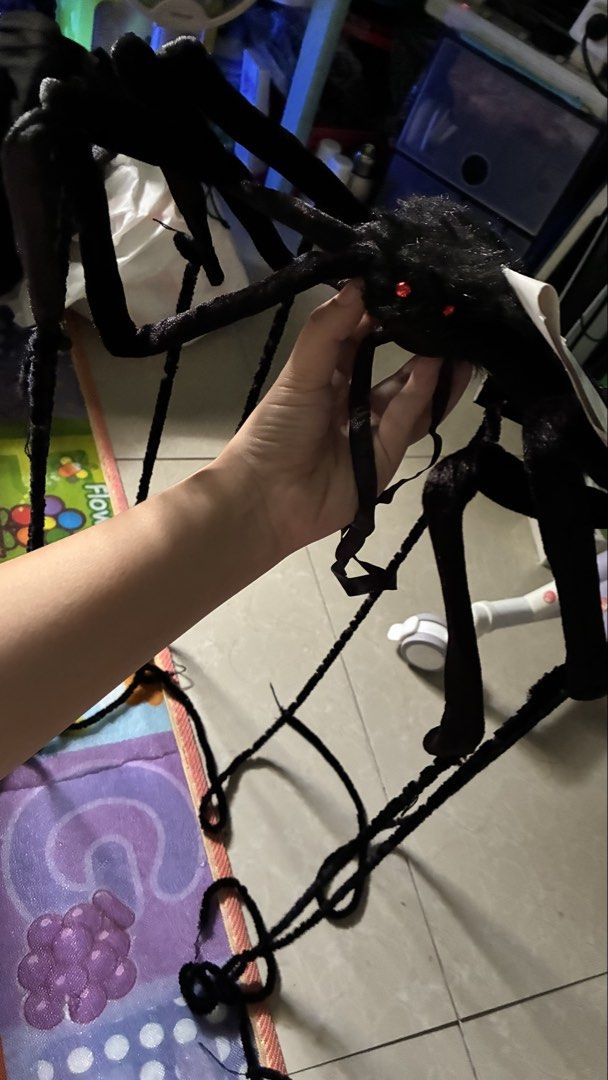 Decorative Spider Halloween Prop (Category: Lighting) located in Manila. Submitted by dukejah (Listing ID 1469589657, Image 2). Description: - Authentic IKEA Halloween decorative spider - Big fuzzy black body with striking red eyes - Long bendable legs for easy positioning - Super lightweight, perfect for hanging or placing anywhere - Ideal for haunted houses, parties, and spooky room decor.