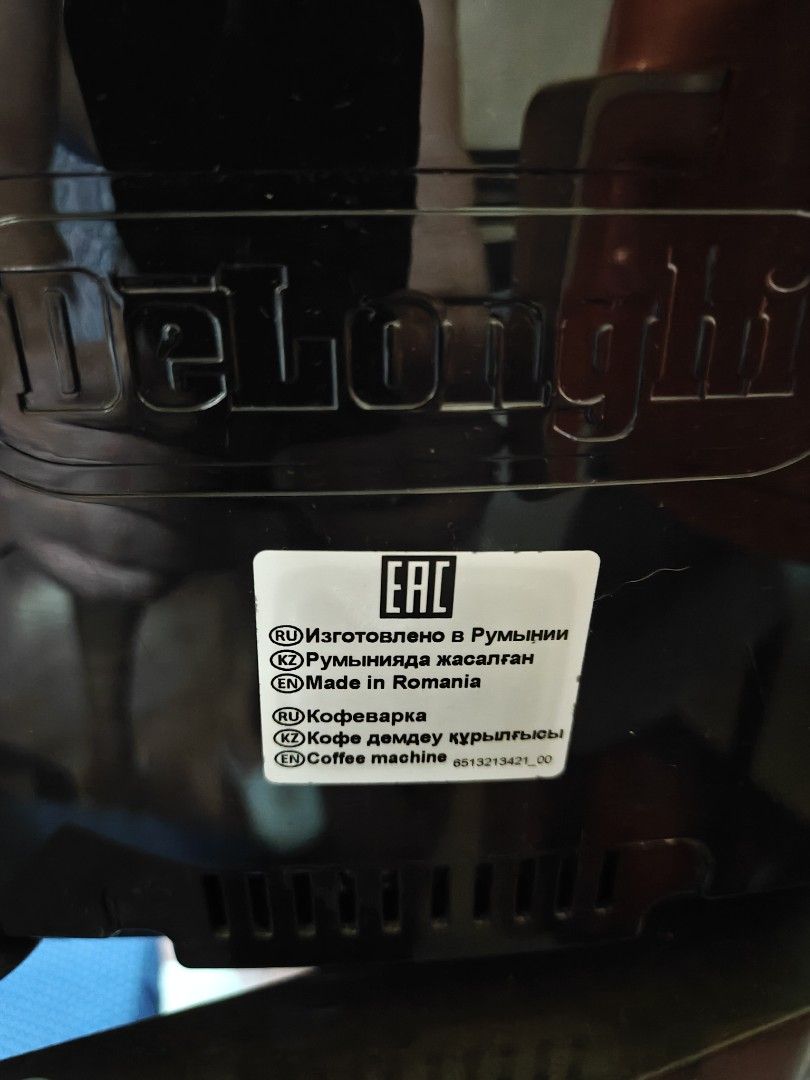 DeLonghi Magnifica S Espresso Machine (Category: Coffee Machines & Makers) located in Manila. Submitted by bok.dizon (Listing ID 1469582377, Image 3). Description: - Brand: DeLonghi Magnifica S Bean-to-Cup Espresso Maker - Color: Black finish with a stylish silver control panel - Versatile: Works with both whole coffee beans and pre-ground coffee - Features: Built-in steam wand for milk frothing, dual spouts, and a top cup warming tray - Efficien