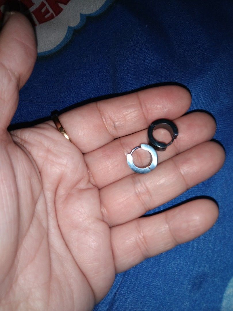 D&G Black Hoop Earrings non tarnish thick (Category: Earrings) located in Quezon City. Submitted by eidorableshop (Listing ID 1469704576, Image 3). Description: - Brand: Dolce & Gabbana (D&G) - Color: Black - Style: Minimalist hoop earrings with etched branding - Closure: Simple hinged design for easy wear - Condition: Clean, well-maintained, no major flaws - Perfect for daily casual outfits.