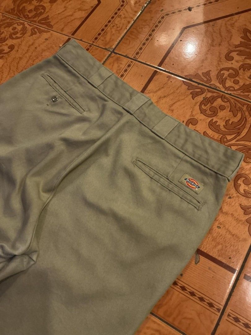 Dickies 874 Original Fit Work Pants Khaki (Category: Trousers) located in Manila. Submitted by cualesdyla42584 (Listing ID 1469657322, Image 2). Description: - Brand: Dickies - Model: 874 Original Fit Work Pants - Color: Khaki - Fit: Classic straight leg with belt loops and button closure - Details: Signature branded inner waistband lining, two back pockets with Dickies logo tag - Material: Sturdy, durable twill fabric - Condition: Minor wear and