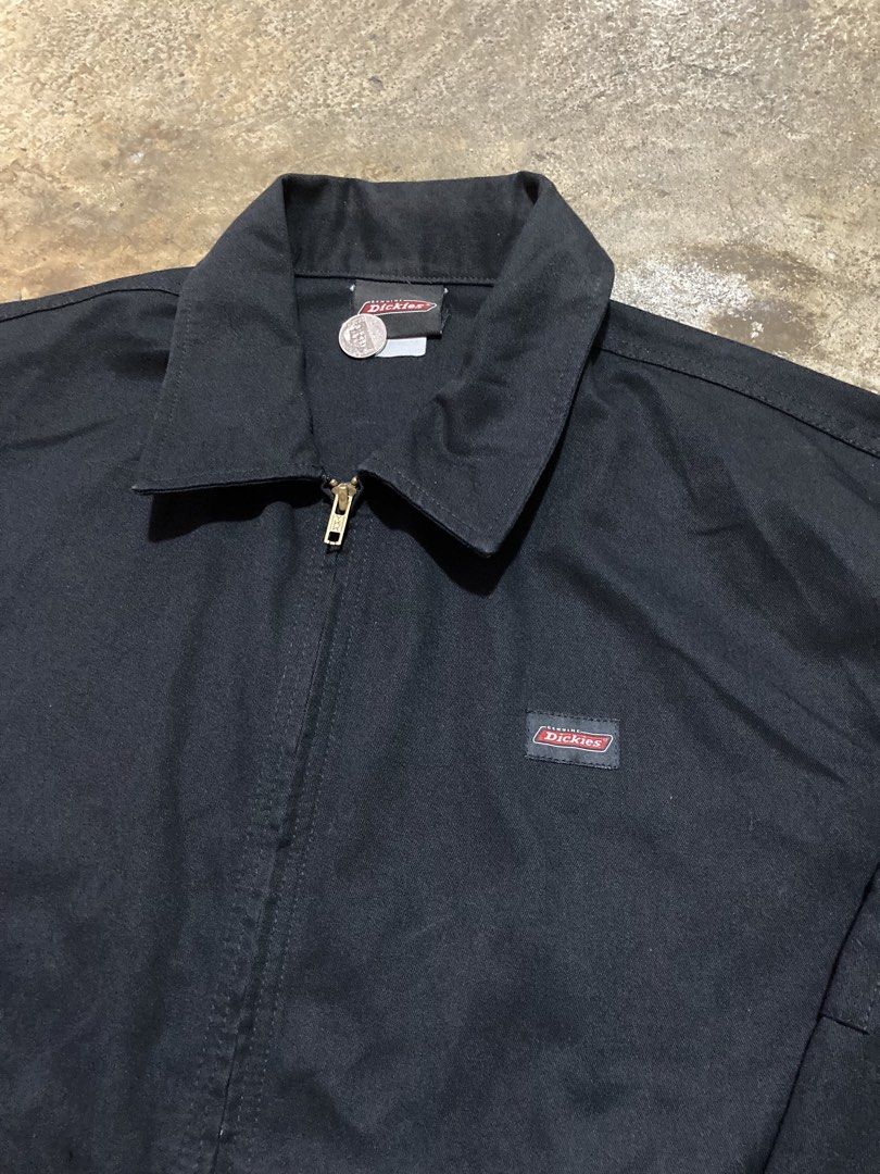 Dickies Black Work Jacket (Category: Coats, Jackets and Outerwear) located in Pasay City. Submitted by ken_98 (Listing ID 1469724497, Image 2). Description: - Authentic black Dickies work jacket - Features a classic collar, front zip closure, and logo patch on the chest - Made from durable, heavy-duty canvas material - Classic fit, ideal for easy layering - Versatile staple piece for any streetwear or casual wardrobe.