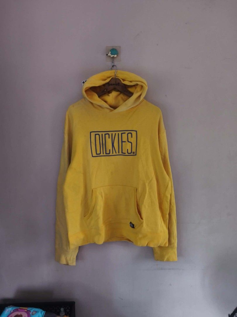 Dickies Yellow Hoodie XL (Category: Coats, Jackets and Outerwear) located in Manila. Submitted by cookthrift (Listing ID 1469575953, Image 1). Description: - Brand: Dickies - Size: XL - Color: Vibrant yellow with a bold blue framed chest logo - Material: Comfortable cotton blend - Features: Kangaroo pocket, drawstring hood, branded inner neck taping, and a small woven logo tag near the hem size XL Very good condition sunfade.