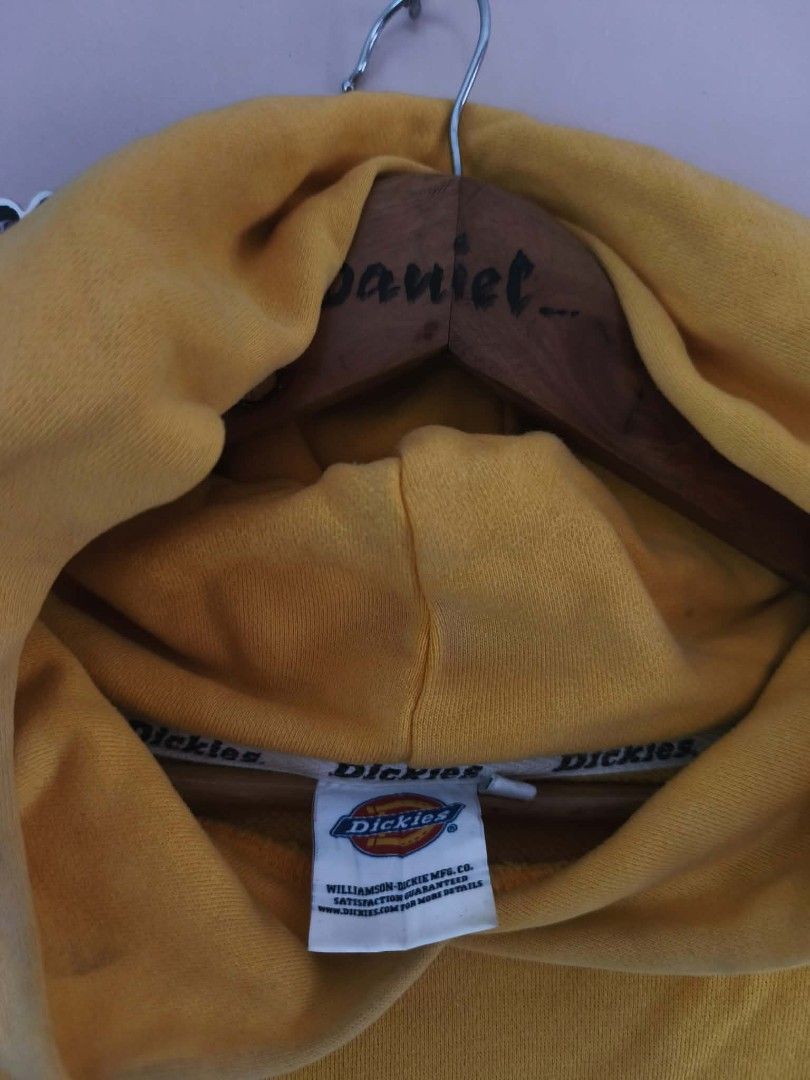 Dickies Yellow Hoodie XL (Category: Coats, Jackets and Outerwear) located in Manila. Submitted by cookthrift (Listing ID 1469575953, Image 2). Description: - Brand: Dickies - Size: XL - Color: Vibrant yellow with a bold blue framed chest logo - Material: Comfortable cotton blend - Features: Kangaroo pocket, drawstring hood, branded inner neck taping, and a small woven logo tag near the hem size XL Very good condition sunfade.