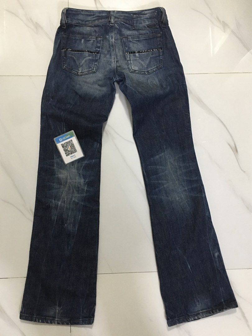 Diesel Denim Jeans Best Fit 25.5” (Category: Jeans) located in Pasay City. Submitted by gilbertso62551 (Listing ID 1469659562, Image 2). Description: - Brand: Diesel - Style: Denim jeans in dark blue wash - Size: W24 L30 (Waistband tag) - Measurements: Approx. 12.75” across the waist, 37" total length - Details: Front patch pockets with Diesel Industry red tag, back pockets with studded trim - Condition: Pre-owned with natural fading and distress