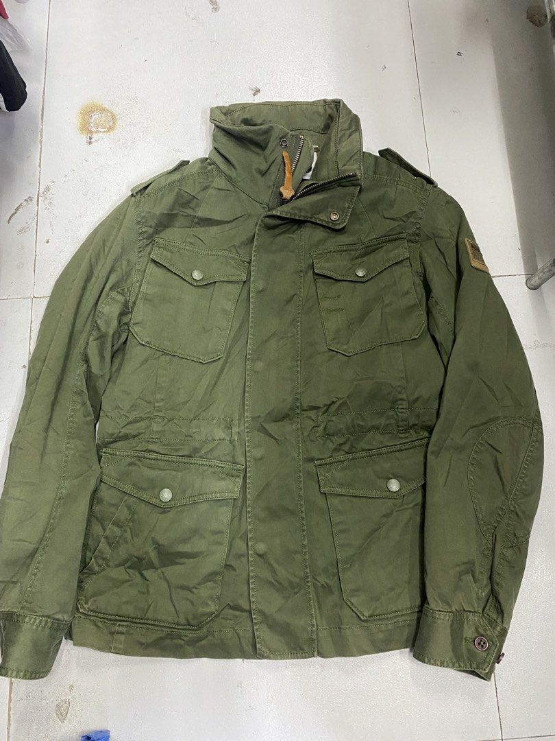 Diesel Green Military Cargo Jacket (Category: Activewear) located in Alburquerque. Submitted by zanegavynn43872 (Listing ID 1469585647, Image 1). Description: - Brand: Diesel - Style: Green military utility jacket - Material: 98% cotton, 2% elastane with cow leather accents - Features: Four front flap pockets, secure zip closure with pull tab, shoulder epaulets - Origin: Made in India - Condition: Excellent.