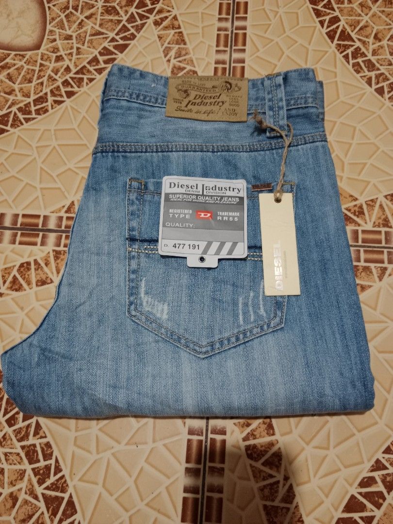 Diesel Industry Denim Division Jeans (Category: Jeans) located in Toledo. Submitted by zealzionta54269 (Listing ID 1469653809, Image 1). Description: - Brand: Diesel Industry -size 36 - Wash: Light wash with subtle distressing - Fit: Classic straight leg - Details: Branded metal buttons and classic leather patch on the back waistband - Condition: Brand new with original tags attached (Type RR55, No. 477 191) - Perfect for daily wear and casual st