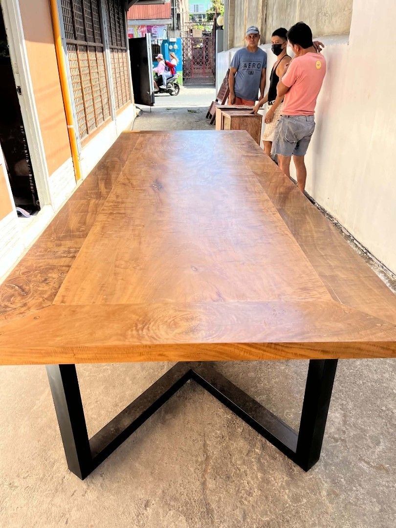 Dining table 10-12 seaters❤ molave (Category: Tables & Sets) located in Manila. Submitted by carmelites36250 (Listing ID 1469595937, Image 1). Description: Dining table 10-12 seaters ❤❤❤ Solid molave wood 🎯 Metal stand Heavy/ thick Pm me ☎☎☎☎ Price-75k.