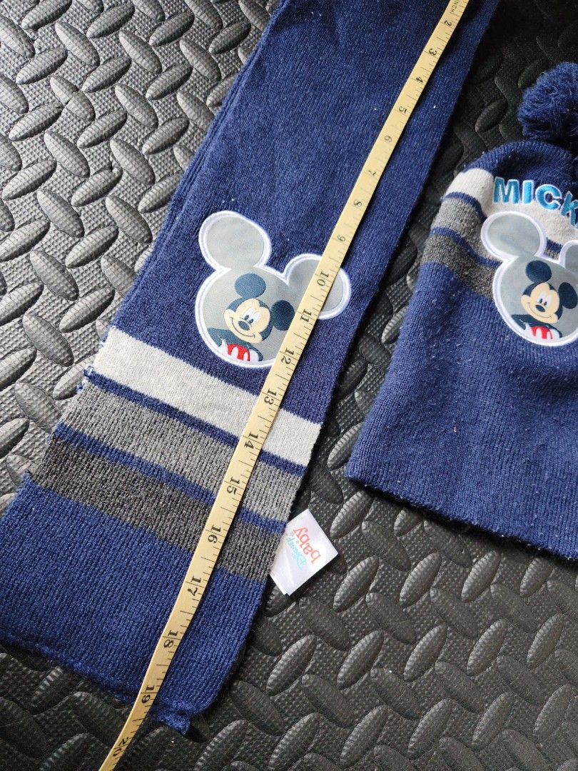 Disney Baby Scarf & Knit Cap (Category: Bedding & Towels) located in Quezon City. Submitted by zs.onlinehub (Listing ID 1469616033, Image 2). Description: - Authentic Disney Baby striped knit blanket - Color: Blue, grey, and white - Soft and lightweight fabric - Ideal for stroller use or the nursery - Features a securely stitched Disney Baby tag - Perfect for gifting or everyday use P.S. mas darker color sa personal.