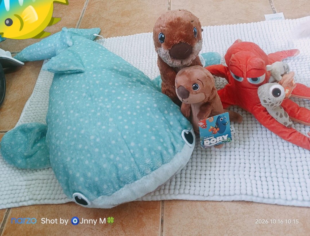 Disney Pixar Finding Dory and Friends Plush Toy Bundle (Category: Plushies & Soft Toys) located in Taguig. Submitted by mhayestufftoys (Listing ID 1469589847, Image 1). Description: - Disney Pixar Finding Dory plush toy bundle - Set includes: Large whale shark, 2 otters, red octopus, and a small turtle - Condition: Super soft fabric, one otter still has the original tag attached - Perfect for movie fans and kids' room decor - Selling as a full se