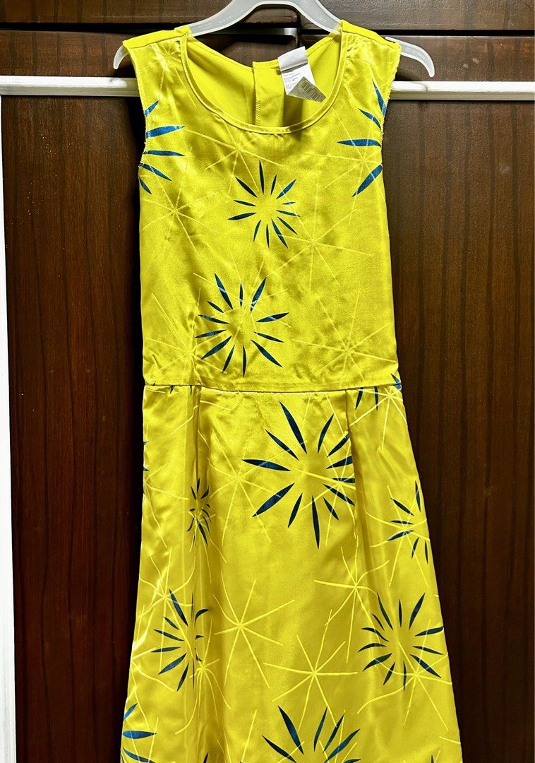 JOY Inside Out Costume with wig (Category: Babies & Kids Fashion) located in Pasig City. Submitted by royalregistry (Listing ID 1469607298, Image 1). Description: Joy Disney Pixar Inside Out yellow dress. Blue starburst pattern all over. Size L 10-12. Tag still attached to the collar. Blue wig included Great for Halloween parties or dress-up days. Fun character outfit from the movie..