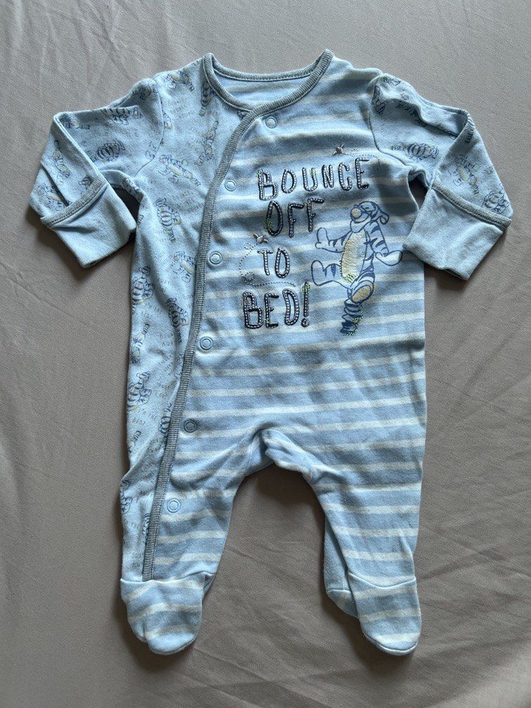 Disney Tiger blue and white snap button frogsuit (Category: Babies & Kids Fashion) located in Quezon City. Submitted by declutter.qc (Listing ID 1469586354, Image 1). Description: Footed & with reversible mittens.