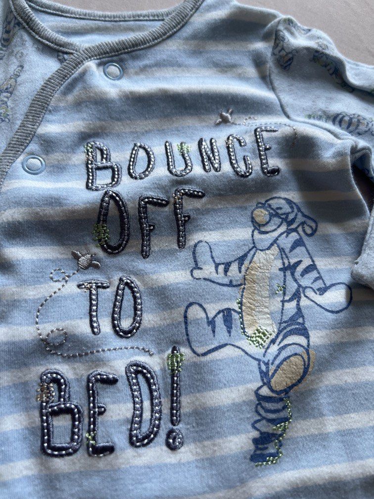 Disney Tiger blue and white snap button frogsuit (Category: Babies & Kids Fashion) located in Quezon City. Submitted by declutter.qc (Listing ID 1469586354, Image 2). Description: Footed & with reversible mittens.
