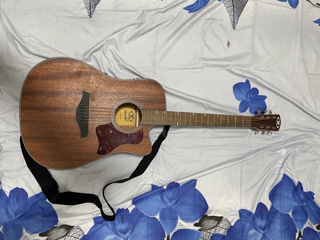 Django Guitar LE (Category: Musical Instruments) located in Manila. Submitted by jhonmarvin33311 (Listing ID 1469580427, Image 1). Description: Selling my Django LE Guitar. Only used casually for about a month when I was learning guitar, so it’s still lightly used and in good condition. Inclusions: * Thickly padded guitar bag * Capo * Guitar picks * Neck adjuster * Extra set of guitar strings The guitar also has a built-in tuner and AUX connectio