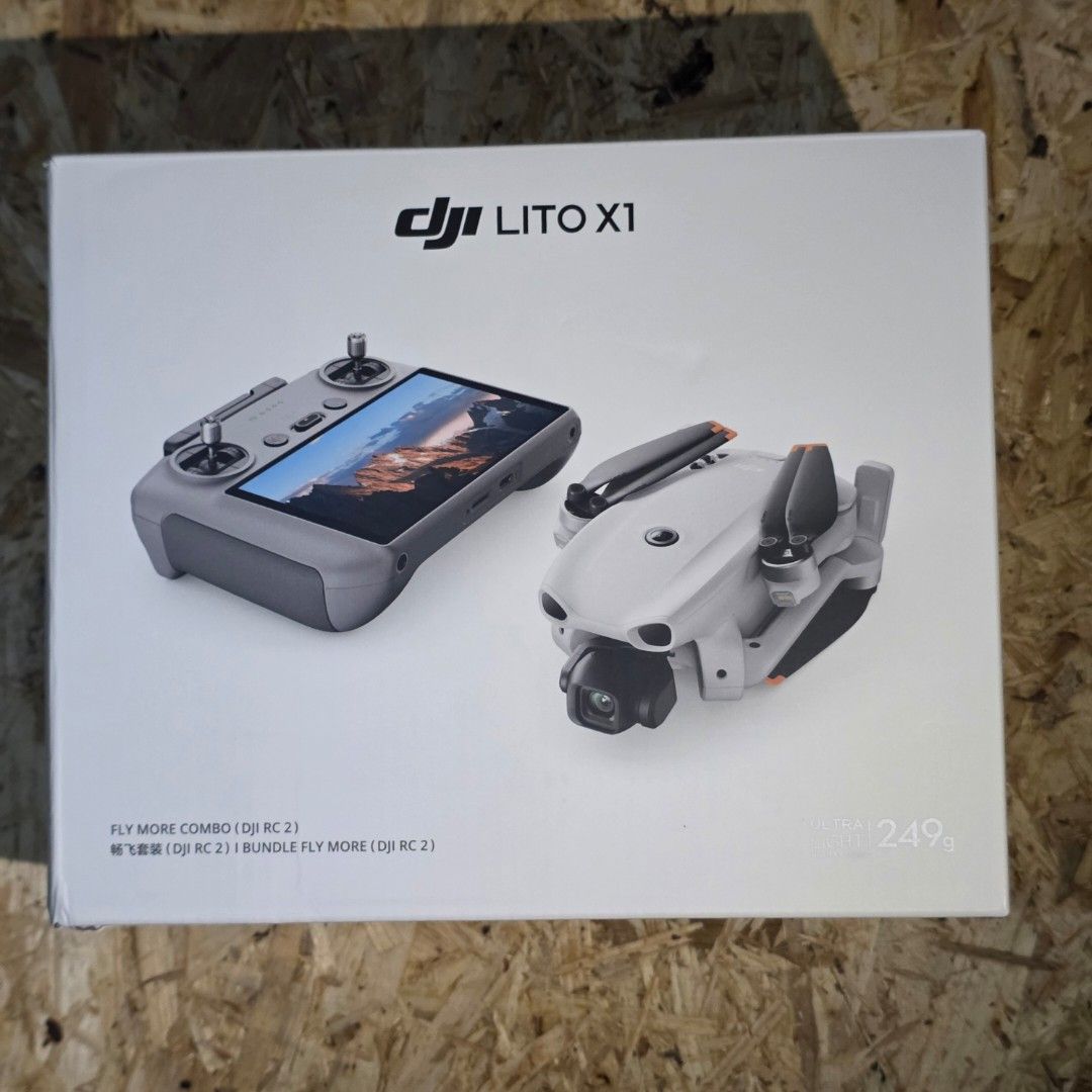 DJI Lito X1 Fly More Combo RC 2 Drone (Category: Drones) located in Pasay City. Submitted by xsamskie (Listing ID 1469684630, Image 1). Description: - Condition: Brand new, factory-sealed box - Model: DJI Lito X1 Fly More Combo - Weight: Ultra-light under 249 grams - Controller: DJI RC 2 with built-in screen - Power: 3 intelligent flight batteries & two-way charging hub - Accessories included: Shoulder bag, gimbal protector, screwdriver, and 3 pa