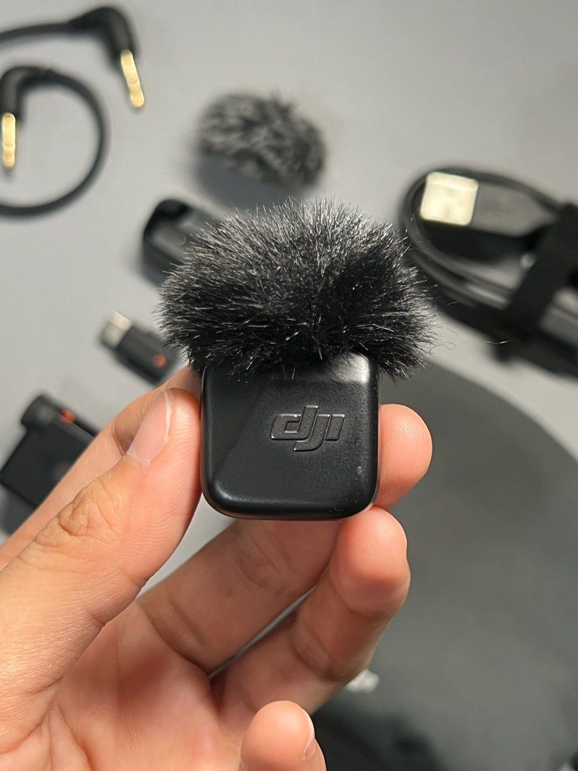 DJI Mic Mini Transmitter + Receiver for Camera and Smartphone (Category: Microphones) located in Malabon City. Submitted by enricogomez (Listing ID 1469733379, Image 2). Description: DJI Mic Mini Transmitter + Receiver for Camera and Smartphone • excellent condition • no issue Inclusions • 1tx (transmitter) • 1rx (receiver) • 2pcs windscreen • trs cable • charging cable • tx charging dock • mini pouch Preferably meetup only for safe transactions.