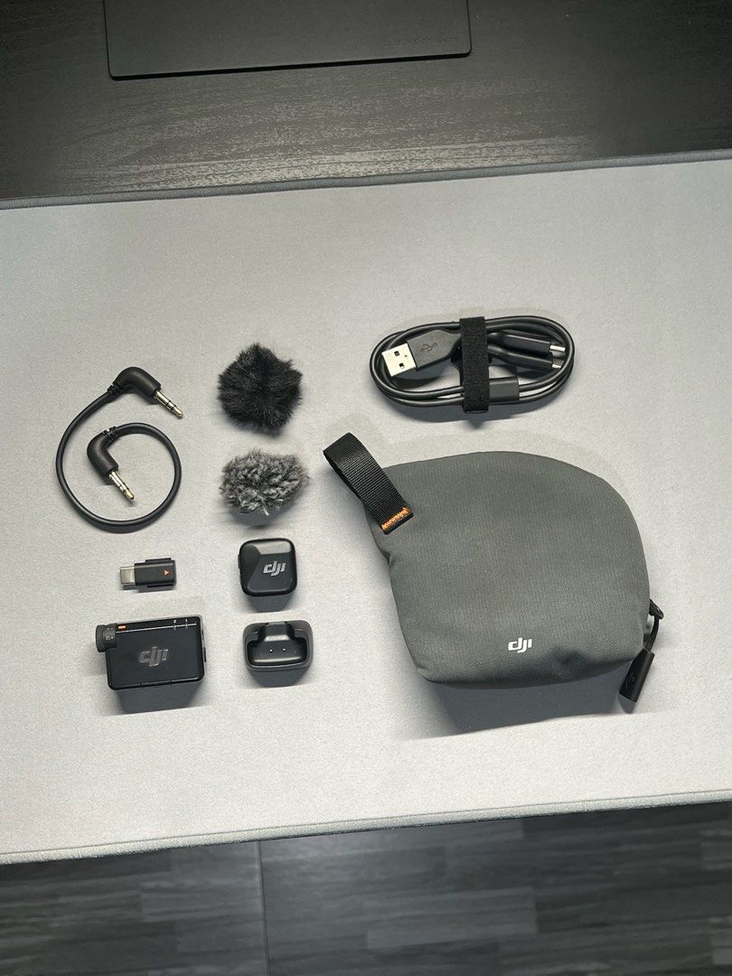 DJI Mic Mini Transmitter + Receiver for Camera and Smartphone (Category: Microphones) located in Malabon City. Submitted by enricogomez (Listing ID 1469733379, Image 1). Description: DJI Mic Mini Transmitter + Receiver for Camera and Smartphone • excellent condition • no issue Inclusions • 1tx (transmitter) • 1rx (receiver) • 2pcs windscreen • trs cable • charging cable • tx charging dock • mini pouch Preferably meetup only for safe transactions.