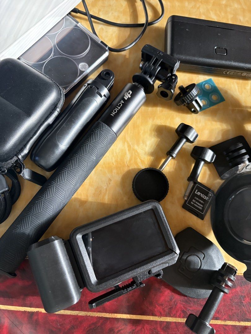 DJI Osmo Action 5 Pro Adventure Combo (Category: Cameras) located in San Pablo. Submitted by jhenzcosico (Listing ID 1469575136, Image 3). Description: - Item: DJI Osmo Action 5 Pro Action Camera Bundle - Condition: Complete set, ready to use - Includes original box and charging case - Accessories: Extension rod, protective casing, multiple mounts, and thumb screws - Extras: Cable and Lexar MicroSD adapter included - Perfect for sports, travel, a